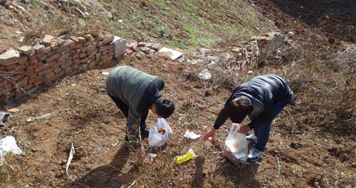 商洛學院志愿者以實際行動愛護家園